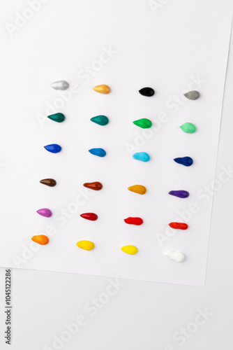 Paint blobs of different colors isolated on white, set
