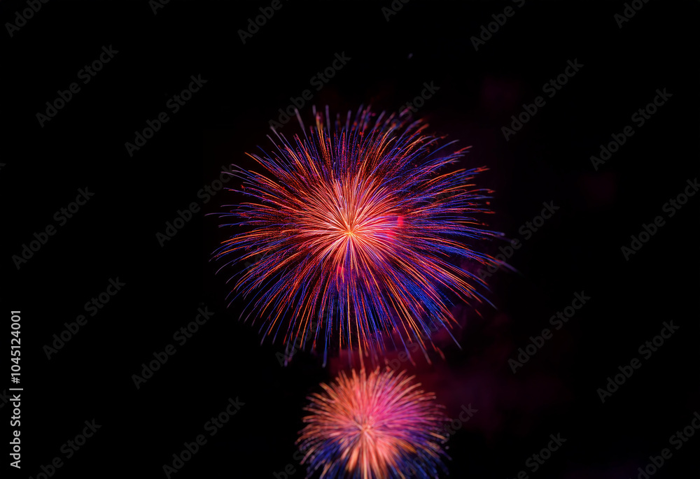 A vibrant firework bursts against a dark sky, its red, orange, and purple sparks reaching upwards. A vibrant firework bursts against a dark sky, its red, orange, and purple sparks reaching upwards.