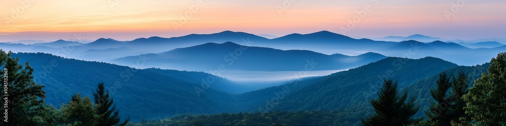 Panoramic view of a majestic mountain range at sunrise with glowing peaks and vibrant sky, nature landscape background Panoramic view of a majestic mountain range at sunrise with glowing peaks and vibrant sky, nature landscape background