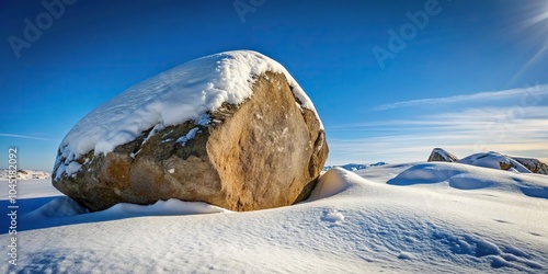 Snow covered rock at a tilted angle