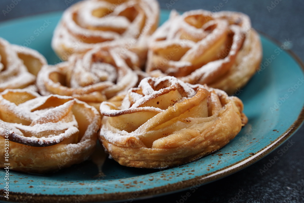 Rose shape apple pastry with cinnamon and shugar powder Rose shape apple pastry with cinnamon and shugar powder
