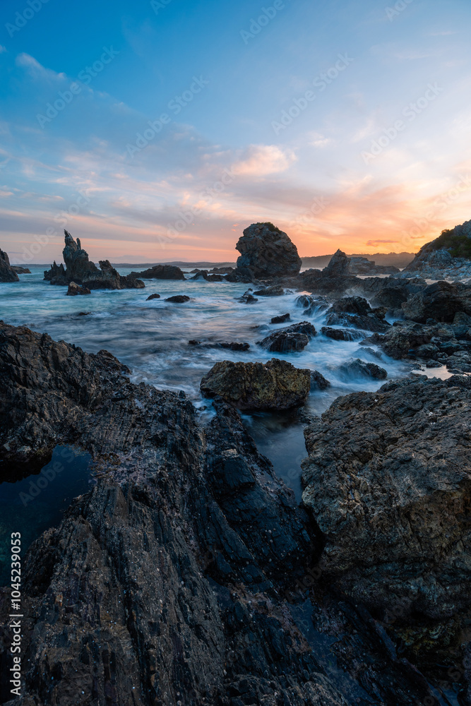 Beautiful sunset view on the rocky beach shore. Beautiful sunset view on the rocky beach shore.