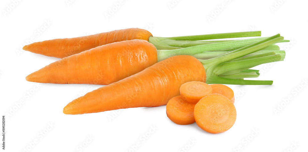 Fresh ripe carrots on white background. Whole and sliced Fresh ripe carrots on white background. Whole and sliced