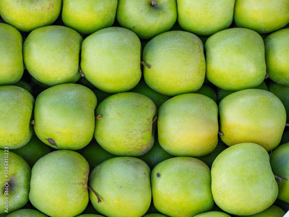 Stand of Red and green apples on the market counter. Apple on the grocery shelf. Supermarket. Apple harvest on the supermarket counter. Farm apples in boxes on a market display. Stand of Red and green apples on the market counter. Apple on the grocery shelf. Supermarket. Apple harvest on the supermarket counter. Farm apples in boxes on a market display.