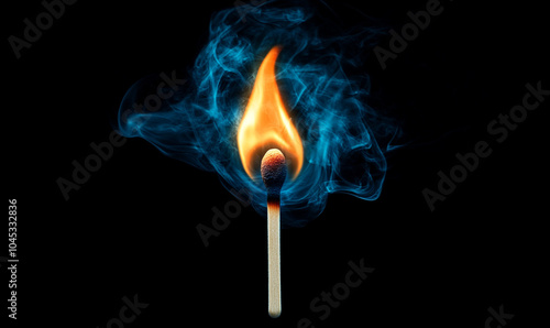  A lit matchstick with a vibrant flame against a dark background, symbolizing ignition and light.