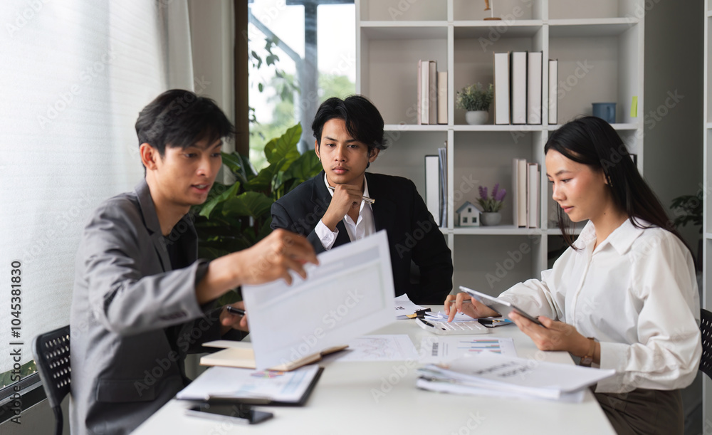Diverse Team of Business Professionals Collaborating and Sharing Ideas in a Modern Conference Room Setting Diverse Team of Business Professionals Collaborating and Sharing Ideas in a Modern Conference Room Setting
