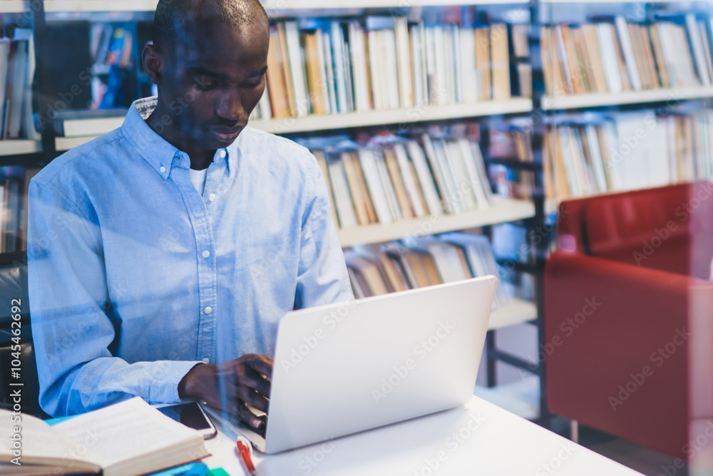 Multiethnic colleagues working in library Multiethnic colleagues working in library