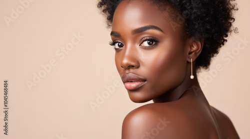 Elegant Black Female Model in High-Fashion Glamour Photography – Natural Beauty with Melanin Glow on Neutral Background