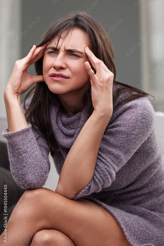 Young woman suffering from a strong headache Young woman suffering from a strong headache