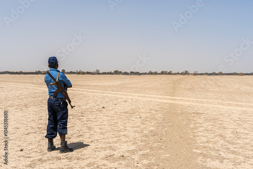 Ethiopian soldier standing guard in the Danakil Depression, Ethiopia, Africa