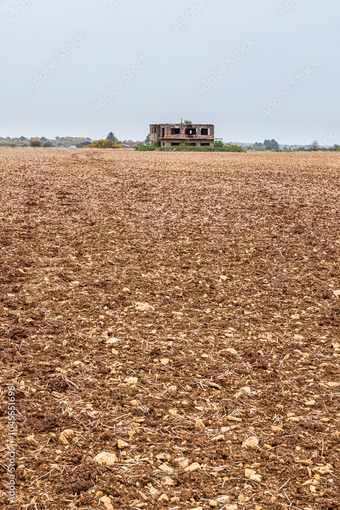 The remains of the control tower of the Second World War airfield of RAF Broadwell near the village of Kencot, Oxfordshire, England UK