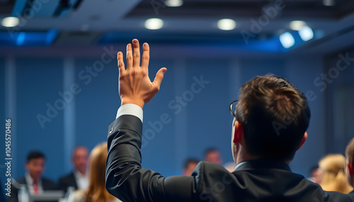 Businessman raising hand during conference presentation to ask a question isolated with white highlights, png