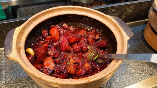 China, Canton - different style of Asian food. Self-service restaurant offering hot meals in Guangzhou. Baked pork bacon.