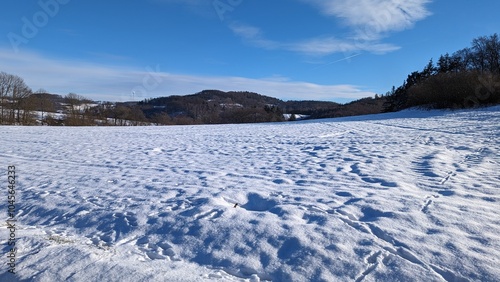 A snowy field in winter in Sauerland