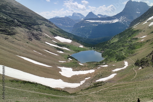 ptarmigan lake on the trail to Ptarmigan Tunnel at the Glacier national park, Montana, USA. photo