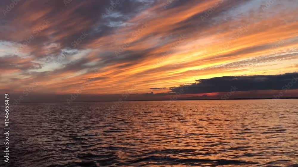 dramatic sunset at sea low dark red clouds dramatic sunset at sea low dark red clouds