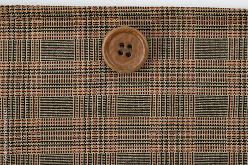 clothing details and decorative elements, pockets and seams,brown  fabric, textiles photo