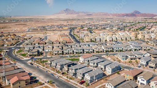 Residential development in Henderson, Las Vegas, Nevada showcasing new homes and dry mountainous landscape under clear skies