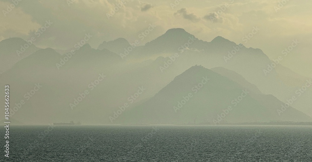 Far away view of Taurus Mountains on the horizon of the Mediterranean Sea in Turkey