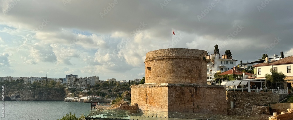 The ancient tower still standing in the old town of Antalya, Turkey