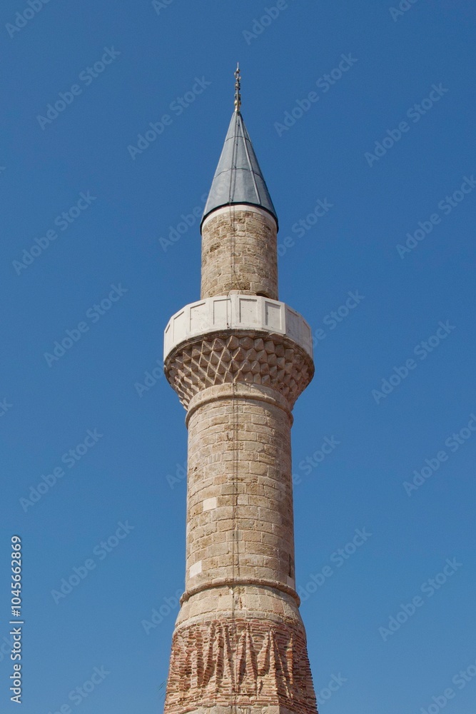 A minaret of an old mosque in the old town of Antalya, Turkey