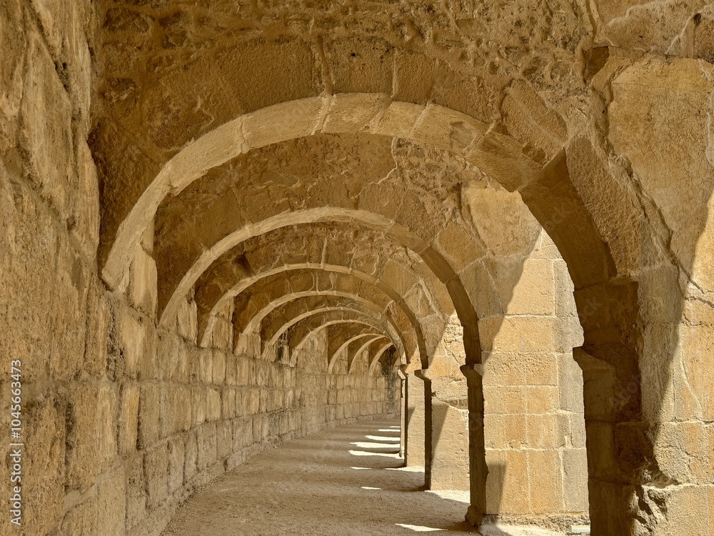 Arched hallway on top of the Roman theater in ancient Greco-Roman city of Aspendos, Turkey