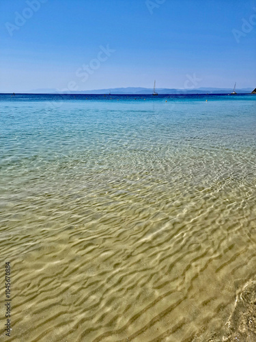 The sandy azure beach of Koukounaries on the Greek island of Skiathos. Europe.