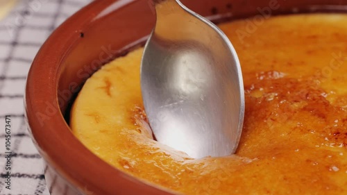 Spanish traditional food, catalonian dessert, crema catalana, catalan cream, spanish dessert close up, cooking. photo