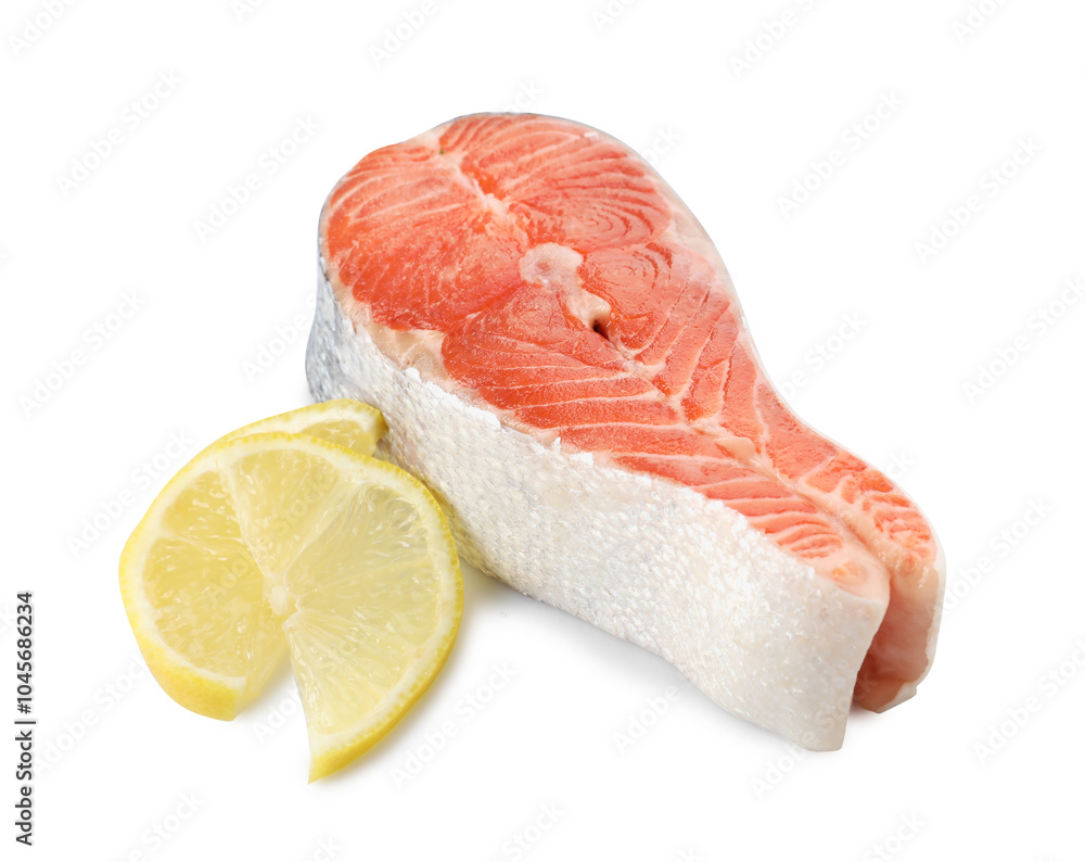 Fresh salmon steak and piece of lemon isolated on white Fresh salmon steak and piece of lemon isolated on white