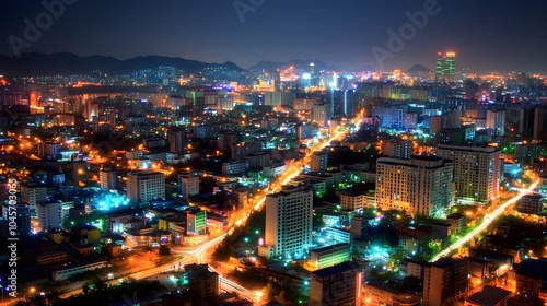 Wallpaper Mural Stunning night view of a vibrant city skyline illuminated by colorful lights. Torontodigital.ca