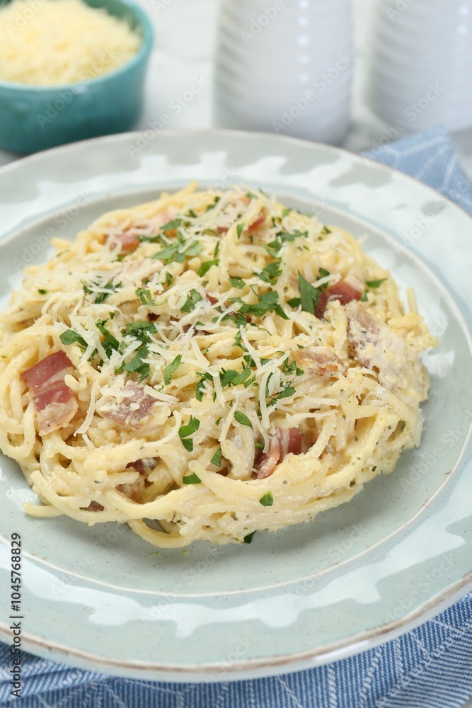 Delicious pasta Carbonara with bacon on table, closeup Delicious pasta Carbonara with bacon on table, closeup