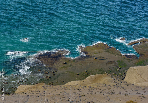 Abstract picture with cliffs, rocks and blue sea. Water and sustainbility concept photo