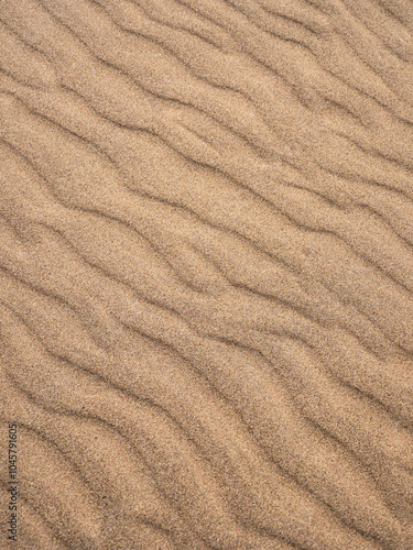 Photography of rippled, wavy sand surface of sea beach.