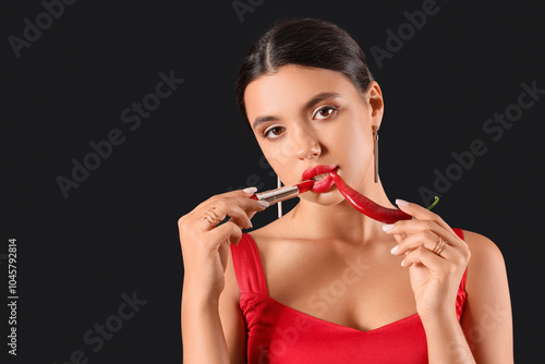Sexy young woman with red l...
