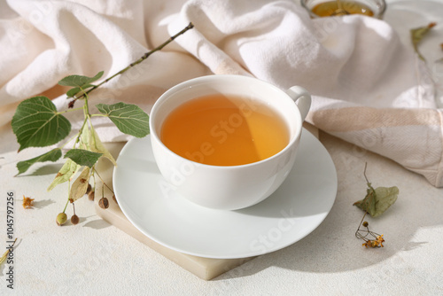 Cup of linden tea with leav...