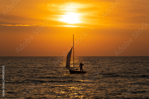 Obraz na płótnie sunset-sea-boat w salonie
