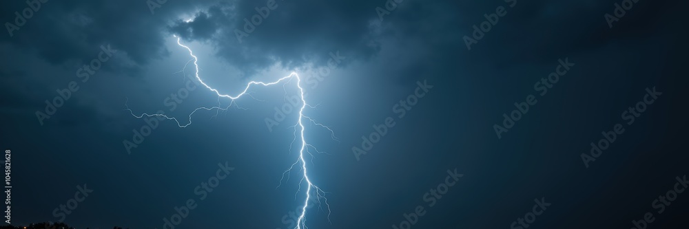 A dramatic lightning strike illuminates a dark stormy sky, capturing the power and beauty of nature's forces. A dramatic lightning strike illuminates a dark stormy sky, capturing the power and beauty of nature's forces.