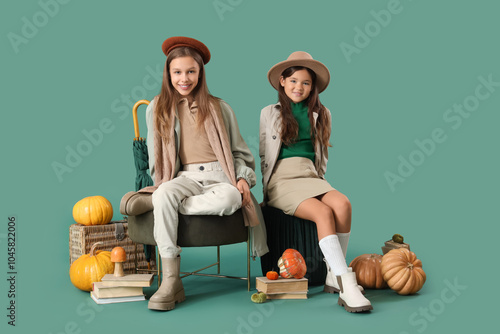 Cute girls in autumn clothe...