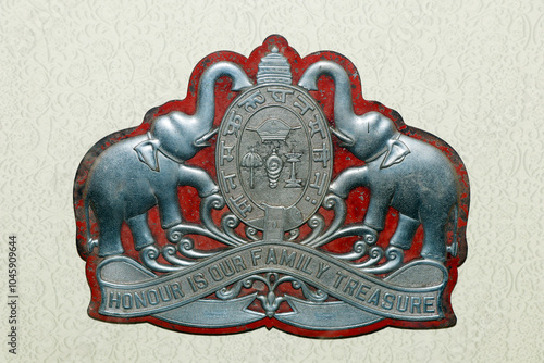 Canvas Print two elephants guarding the kerala state emblem of India