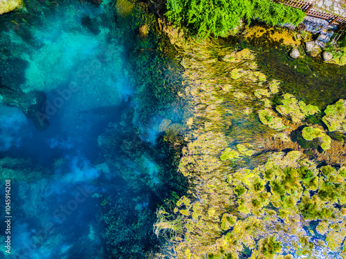 Amazing Gacka river source photographed with drone from above located in Majerovo Vrilo, Croatia photo