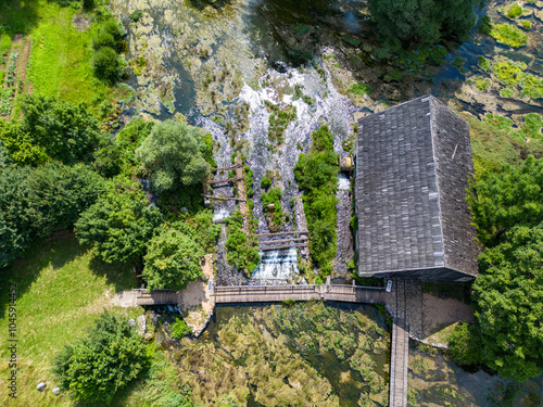 Aerial photo of Majerovo Vrilo, set of wooden mill houses on the source of Gacka river in the village of Sinac, Croatia photo