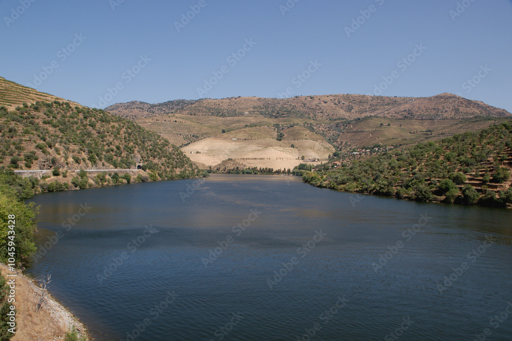 Porto, Portugal 5, August 2024: A picturesque view of the Douro Valley. The photograph has been taken from the Miradouro Train. Porto, Portugal 5, August 2024: A picturesque view of the Douro Valley. The photograph has been taken from the Miradouro Train.