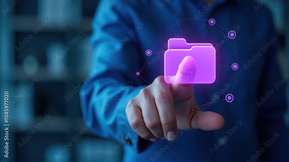 A person interacts with a glowing digital folder icon on a futuristic touchscreen interface, indicating modern technology and data management. A person interacts with a glowing digital folder icon on a futuristic touchscreen interface, indicating modern technology and data management.
