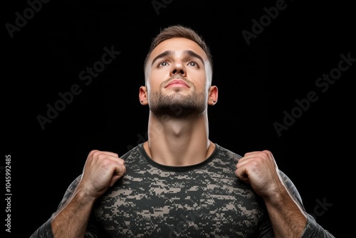 A man standing proudly in a uniform, exuding pride, strength, and self-respect in his appearance and posture