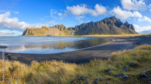 Beautiful panoramic view Icelanda??s Stokksnes beach, serene landscape photo