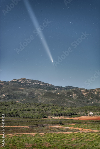 Comet C/2023 A3 Tsuchinshan – ATLAS over the mountains. The comet of the century A large comet hiding on the horizon behind the mountains photo