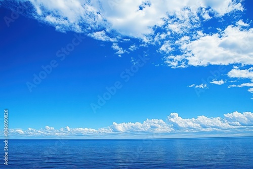 Sky blue wallpaper featuring a wide expanse open sky and a distant horizon