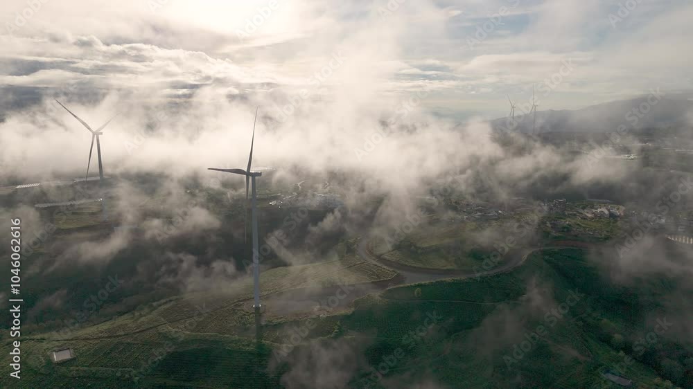 Group of Wind turbines farm in Da Lat, Vietnam. Royalty high-quality free best stock of Wind turbines renewable energy, production clean renewable energy, view of windmills for generating electricity Group of Wind turbines farm in Da Lat, Vietnam. Royalty high-quality free best stock of Wind turbines renewable energy, production clean renewable energy, view of windmills for generating electricity