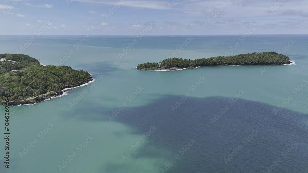 Drone flies from the middle of the islands backwards over Saint Joseph's island to get a view of all the Salvation Islands, near Kourou, French Guiana, France Drone flies from the middle of the islands backwards over Saint Joseph's island to get a view of all the Salvation Islands, near Kourou, French Guiana, France