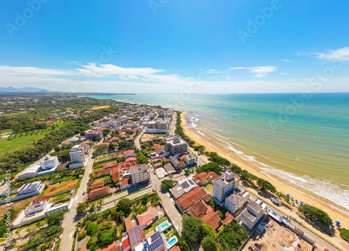 Imagem aérea da praia de Castelhanos em um dia ensolarado. Areias brancas, mar calmo e piscinas naturais. photo